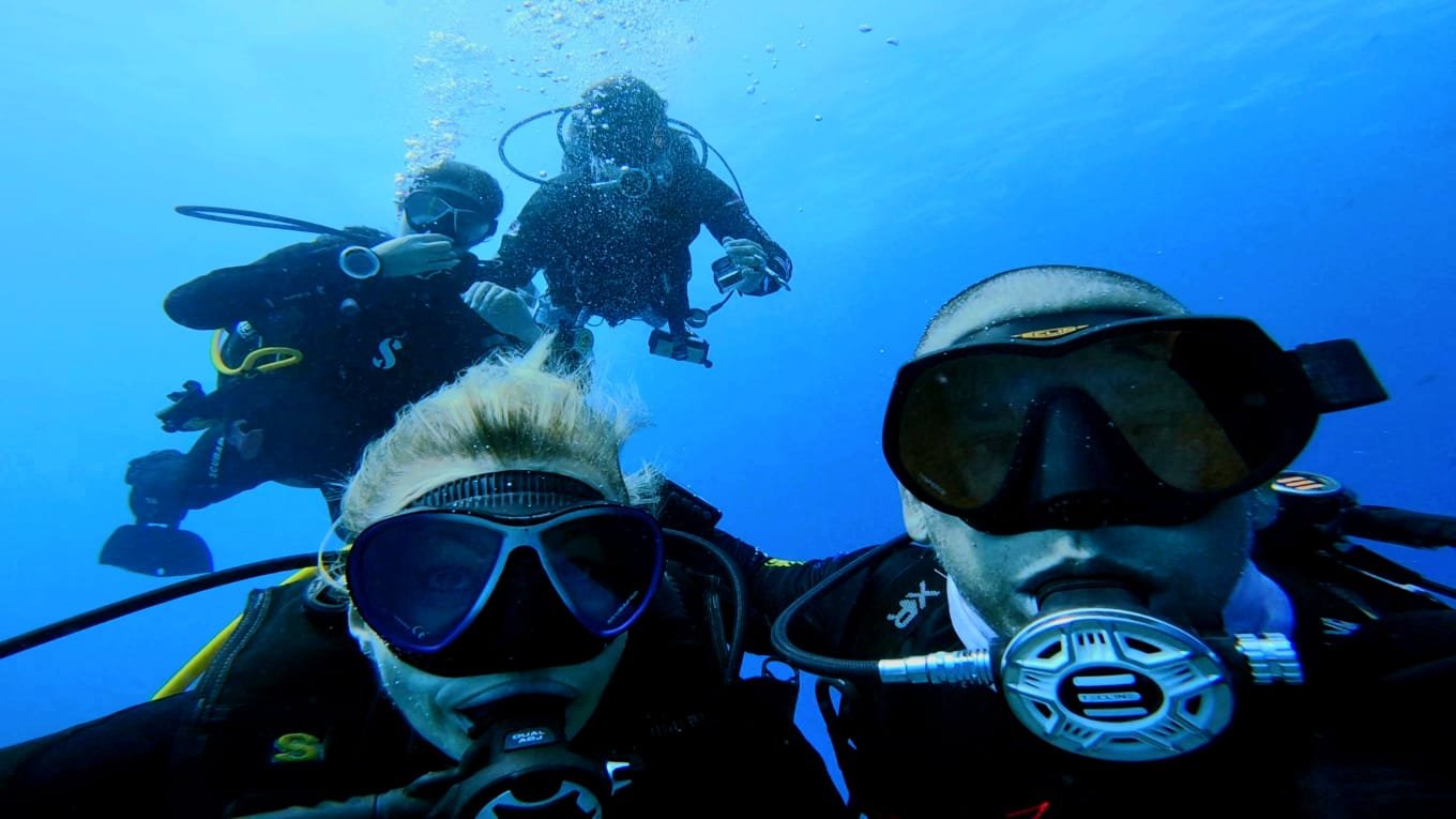 Chris, Nadia, Nealan and Norlenn from ChrisDiving Dive Center